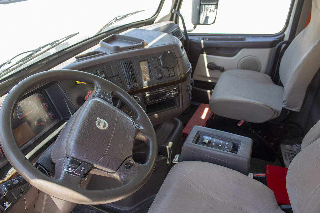 inside the cab of a c60 volumetric concrete mixer truck on a Volvo chassis