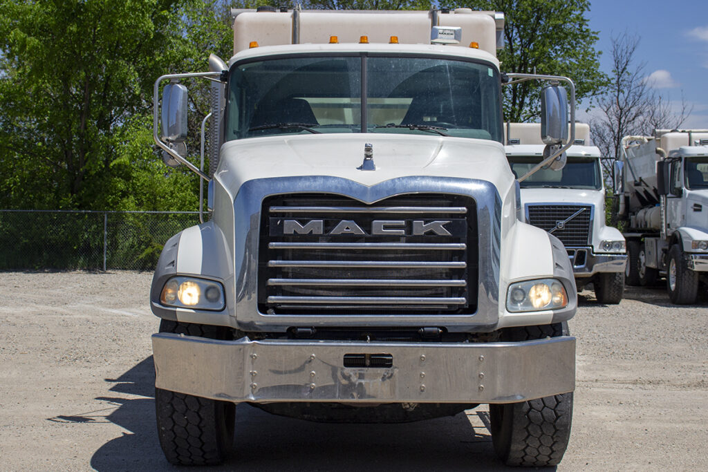 Front view of C60 volumetric concrete mixer on MACK chassis