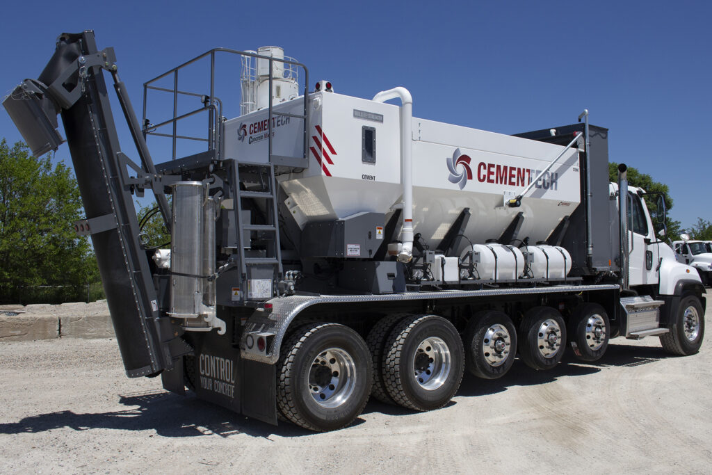 rear view of cemen tech c60 mobile concrete mixer with view of aggregate and cement bins