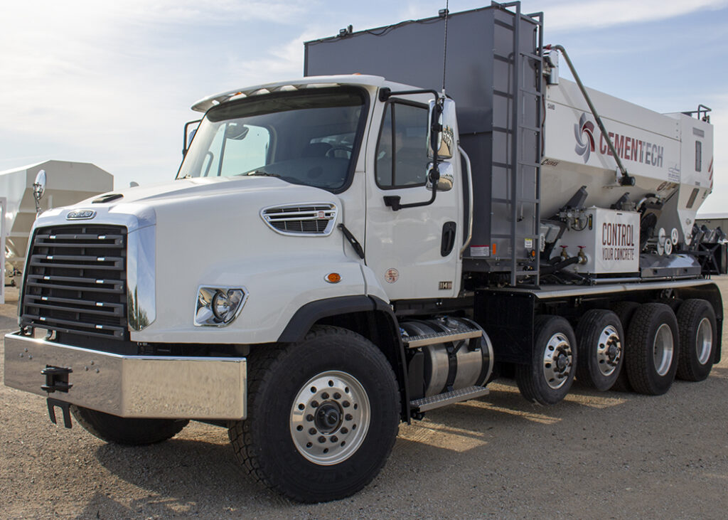 C60 mobile concrete mixer with an insulated water tank staged in a gravel lot