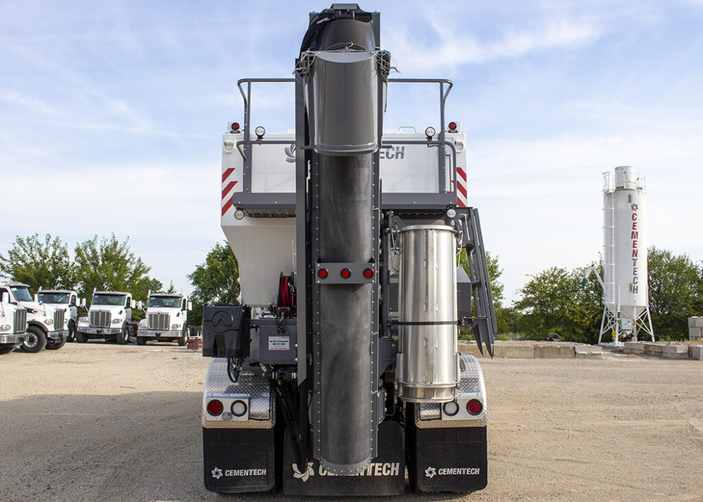 Perfect view of a C60 volumetric concrete mixer's mixing auger and chute